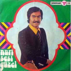 NURİ SESİGÜZEL BENDEN AYRI GEZERSEN  BİR LOKMA EKMEK PEŞİNDE